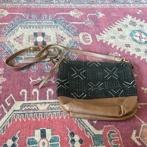 Elegant Black and Tan Crossbody Bag
